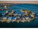 Stunning coastal neighborhood with luxurious homes, private docks, and panoramic ocean views at 516 Belle Isle Ave, Belleair Beach, FL 33786