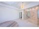 Bright bedroom with carpet and a tiled glass enclosed shower at 516 Belle Isle Ave, Belleair Beach, FL 33786