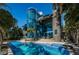 Stunning waterfront home with a private pool, spa, and a modern glass-enclosed tower at 516 Belle Isle Ave, Belleair Beach, FL 33786