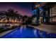 Modern waterfront home boasts a beautiful pool, spa, and stunning sunset views at 516 Belle Isle Ave, Belleair Beach, FL 33786
