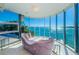 Living room featuring water views and comfortable seating at 516 Belle Isle Ave, Belleair Beach, FL 33786