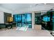 Light-filled main bedroom suite with a makeup vanity, walkout to spiral staircase, and modern finishes at 516 Belle Isle Ave, Belleair Beach, FL 33786