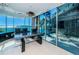 Bright office space with panoramic water views and access to spiral staircase and outdoor lounge area at 516 Belle Isle Ave, Belleair Beach, FL 33786