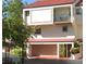 Two-story condo building with attached garage at 240 Windward Psge # 504, Clearwater, FL 33767