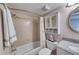 Bathroom with tub/shower combo and granite vanity at 19930 Gulf Blvd # 1A, Indian Shores, FL 33785