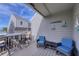 Ocean view deck with seating and outdoor table at 19930 Gulf Blvd # 1A, Indian Shores, FL 33785