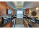Updated kitchen featuring stainless steel appliances and a breakfast bar at 19930 Gulf Blvd # 1A, Indian Shores, FL 33785