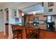 Modern kitchen boasting granite countertops and ample cabinetry at 19930 Gulf Blvd # 1A, Indian Shores, FL 33785