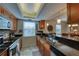 Updated kitchen with stainless steel appliances and granite counters at 19930 Gulf Blvd # 1A, Indian Shores, FL 33785