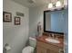 Clean bathroom with granite vanity and updated fixtures at 19930 Gulf Blvd # 1A, Indian Shores, FL 33785