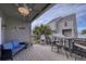 Covered deck with seating, table and ocean view at 19930 Gulf Blvd # 1A, Indian Shores, FL 33785