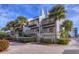 Two-story beach condo building with spiral staircases at 19930 Gulf Blvd # 1A, Indian Shores, FL 33785