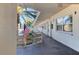 Building hallway with American flag, light-colored walls at 5750 80Th N St # B208, St Petersburg, FL 33709