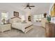 Cozy bedroom with a queen-size bed, built-in shelving, and a tranquil atmosphere at 3136 Neff Lake Rd, Brooksville, FL 34602