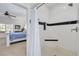 Elegant bathroom with a walk-in shower, black and white tile, and a bench at 3136 Neff Lake Rd, Brooksville, FL 34602