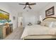 Spacious bedroom with a queen-size bed and access to a bathroom at 3136 Neff Lake Rd, Brooksville, FL 34602