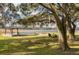 Pool area with gazebo and lake view at 3136 Neff Lake Rd, Brooksville, FL 34602