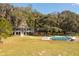 Aerial view of house, pool, and expansive property at 3136 Neff Lake Rd, Brooksville, FL 34602