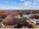 Property showcasing a waterfront view and tree-lined streets at 570 Casler Ave, Clearwater, FL 33755