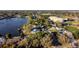 Community overview showing houses near a lake and park at 570 Casler Ave, Clearwater, FL 33755