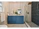 Modern bathroom with double vanity and walk-in shower at 570 Casler Ave, Clearwater, FL 33755