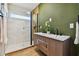 Modern bathroom with double vanity and walk-in shower at 570 Casler Ave, Clearwater, FL 33755