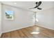Spacious bedroom with hardwood floors and ceiling fan at 570 Casler Ave, Clearwater, FL 33755