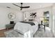 Spacious bedroom featuring a comfortable king bed and ample natural light at 570 Casler Ave, Clearwater, FL 33755