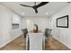 Elegant dining room with hardwood floors and a modern chandelier at 570 Casler Ave, Clearwater, FL 33755
