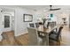 Bright dining room features a farmhouse table and comfortable seating at 570 Casler Ave, Clearwater, FL 33755