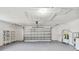 Attached garage with shelving and ample storage space at 570 Casler Ave, Clearwater, FL 33755