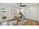 Home office with built-in shelving and large windows at 570 Casler Ave, Clearwater, FL 33755