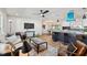 Bright living room features an open floor plan and neutral color palette at 570 Casler Ave, Clearwater, FL 33755