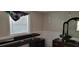Bedroom with a bed, dresser, and window with blinds at 1153 Tamarac Dr, Holiday, FL 34690