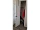 Convenient coat closet with built-in shelving, located near entry at 1153 Tamarac Dr, Holiday, FL 34690