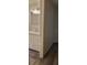 Bright bathroom featuring a white vanity and modern fixtures at 1153 Tamarac Dr, Holiday, FL 34690