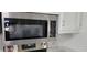 Stainless steel microwave with digital controls at 1153 Tamarac Dr, Holiday, FL 34690