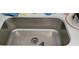 Stainless steel sink with white countertop at 1153 Tamarac Dr, Holiday, FL 34690