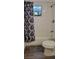 Updated bathroom with white subway tiles, a bathtub, and gray flooring at 1153 Tamarac Dr, Holiday, FL 34690