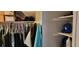 A well-organized closet with shelving and hanging space at 1153 Tamarac Dr, Holiday, FL 34690