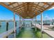 Covered boat lift for convenient access at 295 Bayside Dr, Clearwater Beach, FL 33767