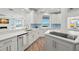 Modern kitchen with water views and high-end finishes at 295 Bayside Dr, Clearwater Beach, FL 33767