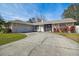 Image 1 of 65: 1102 Robinwood Dr, Oldsmar