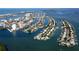 Wide aerial showcasing community and surrounding waterways at 105 Island Way # 121, Clearwater Beach, FL 33767