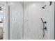 Spa-like shower with marble tile and glass enclosure at 540 Dr Martin Luther King Jr S, St Petersburg, FL 33701