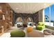 Playful room with soft seating and bookshelves at 5701 Bowen Daniel Dr. # Ph-1701, Tampa, FL 33616