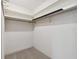 Good-sized closet with hanging rod and shelves for storage at 1001 Eden Isle Ne Dr # 1, St Petersburg, FL 33704