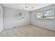 Spacious bedroom with neutral walls and carpet at 1001 Eden Isle Ne Dr # 1, St Petersburg, FL 33704