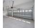 Two-car garage with automatic door openers at 6436 Summit View Dr, Brooksville, FL 34601