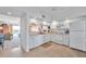 White kitchen with stainless steel appliances at 1200 Country Club Dr # 5402, Largo, FL 33771